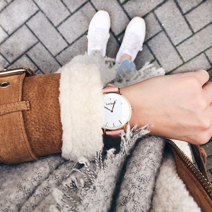 Elegant women's watch with genuine leather strap