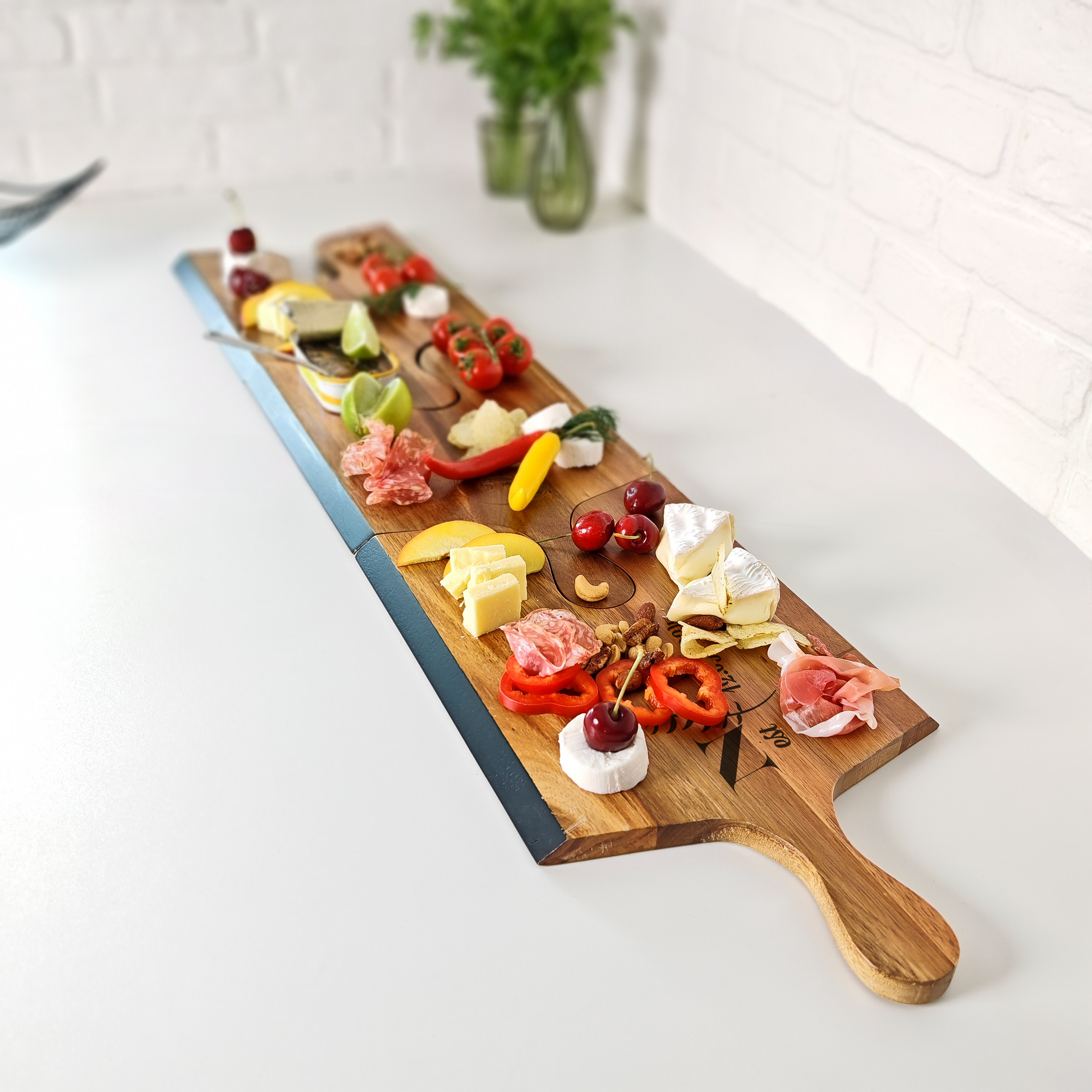 puzzle serving tray made from acacia wood with chalk edge