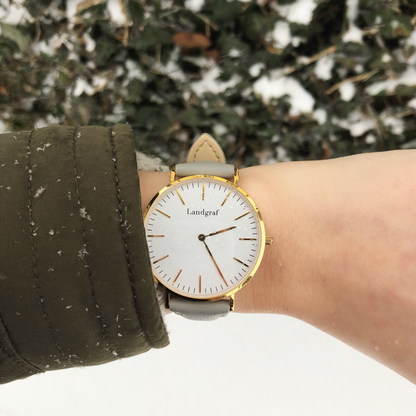 Elegant women's watch with genuine leather strap