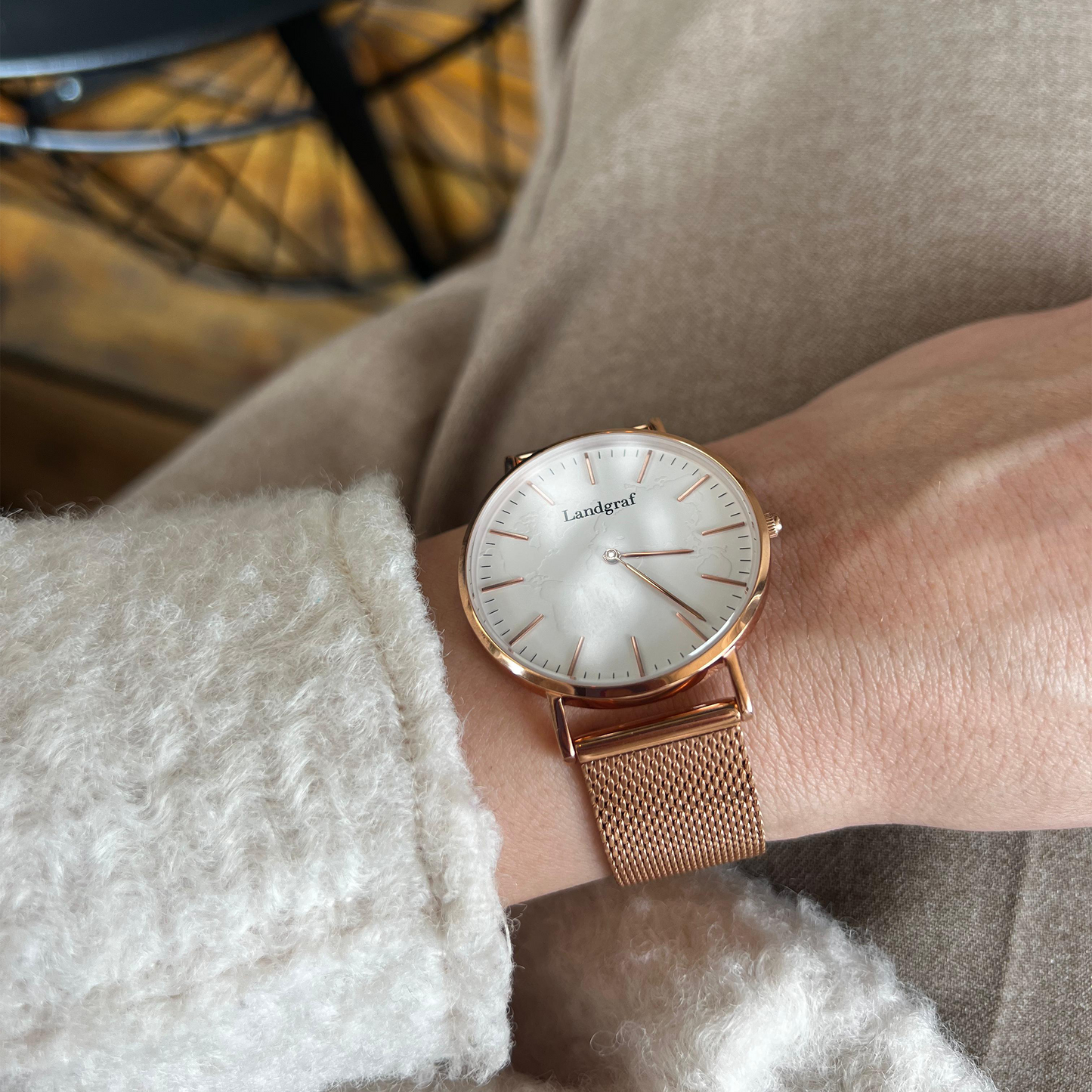 Elegant watch with mesh strap and natural mother-of-pearl dial
